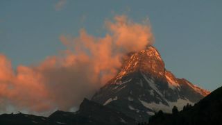 Link to Video | weather, tourist destination, Alps, Matterhorn, summit, region of interest, Swiss Alps, meteorology, landform, Switzerland, Europe, mountain range, tourist attraction, Italy–Switzerland border, cloud, Valais, mountain, point of interest