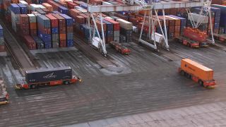 Link to Video | shipping container, maritime transport, logistics, transport hub, industry, Waren, Rotterdam, sea shipping, material flow, container terminal, Netherlands, freight terminal, trade, freight transport, lake transport, transport, trade item, motion, industrial sector, container