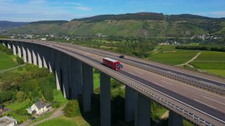 Link to Video | landscape, architecture, bridge, landscape element, private transport, Germany, Schengen Area, landform, Central Europe, road transport infrastructure, building type, traffic, controlled-access highway, geographical feature, transport, human-made geographic feature, human-made geographic feature, architectural structure, thoroughfare, Bundesautobahn 1, mobility
