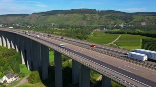 Link to Video | landscape, architecture, bridge, landscape element, private transport, Germany, Schengen Area, landform, Central Europe, road transport infrastructure, building type, traffic, controlled-access highway, geographical feature, transport, human-made geographic feature, human-made geographic feature, architectural structure, thoroughfare, Bundesautobahn 1, mobility