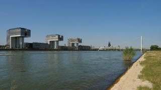 Link to Video | cargo ship, fairway, canal, waterway, body of water, big city, logistics, drainage system, high-angle shot, transport infrastructure, river, inland navigation, city, natural watercourse, transport, thoroughfare