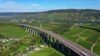 Link to Video | landscape, architecture, bridge, landscape element, private transport, Germany, Schengen Area, landform, Central Europe, road transport infrastructure, building type, traffic, controlled-access highway, geographical feature, transport, human-made geographic feature, human-made geographic feature, architectural structure, thoroughfare, Bundesautobahn 1, mobility