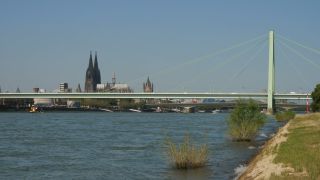 Link to Video | cargo ship, fairway, canal, waterway, body of water, big city, logistics, drainage system, high-angle shot, transport infrastructure, river, inland navigation, city, natural watercourse, transport, thoroughfare