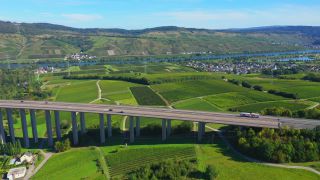 Link to Video | landscape, architecture, bridge, landscape element, private transport, Germany, Schengen Area, landform, Central Europe, road transport infrastructure, building type, traffic, controlled-access highway, geographical feature, transport, human-made geographic feature, human-made geographic feature, architectural structure, thoroughfare, Bundesautobahn 1, mobility