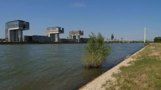 Link to Video | cargo ship, fairway, canal, waterway, body of water, big city, logistics, drainage system, high-angle shot, transport infrastructure, river, inland navigation, city, natural watercourse, transport, thoroughfare