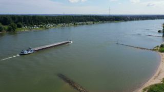 Link to Video | cargo ship, landscape, bird's-eye view, transport, cargo shipping, logistics, Germany, Zons, Central Europe, water, Dormagen, river, Europe, aerial shot, natural watercourse