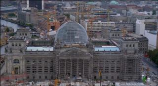 Link to Photo | dome, Reichstag building, Germany, screenshot, 1999, color, 35 mm film, high-angle shot, historic building, construction site, 2K resolution, aerial shot, capital city, tourist attraction, photographic film, Berlin, architectural structure, Berlin Babylon