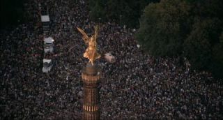 Link to Photo | occurrence, crowd, Love Parade, techno, Germany, screenshot, 1997, 1999, color, 35 mm film, July 12, Straße des 17. Juni, wide shot, Technoparade, 2K resolution, analog camera, capital city, queer, 35 Millimeter, photographic film, Berlin, Party (role-playing games), Berlin Babylon, documentary film