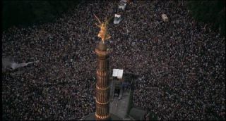 Link to Photo | occurrence, crowd, Love Parade, techno, Germany, screenshot, 1997, 1999, color, 35 mm film, July 12, Straße des 17. Juni, wide shot, Technoparade, 2K resolution, analog camera, capital city, queer, 35 Millimeter, photographic film, Berlin, Party (role-playing games), Berlin Babylon, documentary film