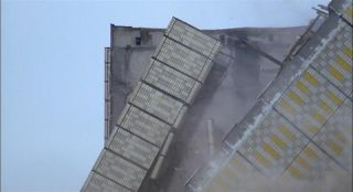 Link to Photo | Plattenbau, structural failure, Eisenhüttenstadt, building implosion, Germany, screenshot, 1998, color, 35 mm film, demolition, 1990s, building, 2K resolution, capital city, photographic film, Berlin, Berlin Babylon, eastern Germany