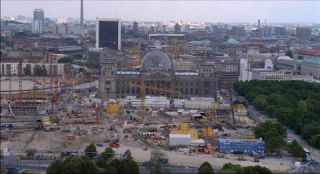 Link to Photo | dome, Reichstag building, Germany, screenshot, 1999, color, 35 mm film, high-angle shot, historic building, construction site, 2K resolution, aerial shot, capital city, tourist attraction, photographic film, Berlin, architectural structure, Berlin Babylon