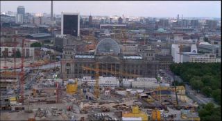 Link to Photo | dome, Reichstag building, Germany, screenshot, 1999, color, 35 mm film, high-angle shot, historic building, construction site, 2K resolution, aerial shot, capital city, tourist attraction, photographic film, Berlin, architectural structure, Berlin Babylon