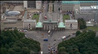 Link to Photo | tourist destination, big city, Germany, screenshot, color, 35 mm film, high-angle shot, 2K resolution, aerial shot, capital city, daytime, tourist attraction, photographic film, Berlin, Berlin Babylon, Brandenburg Gate