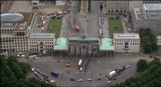 Link to Photo | tourist destination, big city, Germany, screenshot, color, 35 mm film, high-angle shot, 2K resolution, aerial shot, capital city, daytime, tourist attraction, photographic film, Berlin, Berlin Babylon, Brandenburg Gate