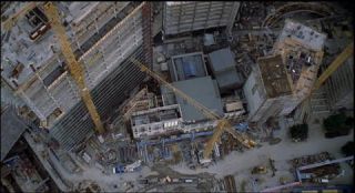 Link to Photo | office building, Potsdamer Platz, high-rise building, Germany, screenshot, 1998, color, 35 mm film, construction crane, high-angle shot, construction site, 2K resolution, aerial shot, capital city, daytime, photographic film, Berlin, Sony Center, Berlin Babylon