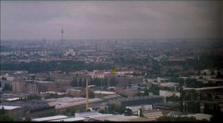 Link to Photo | establishing shot, Fernsehturm Berlin, big city, Mitte, Germany, metropolis, Mitte, screenshot, 1998, color, 35 mm film, wide shot, panorama, cityscape, 2K resolution, aerial shot, capital city, photographic film, Berlin, Berlin Babylon, cloud cover