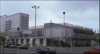 Link to Photo | architecture, Mitte, German Democratic Republic, Germany, screenshot, color, 35 mm film, road, 1990s, building, 2K resolution, capital city, East Berlin, photographic film, Berlin, Karl-Marx-Allee, Berlin Babylon
