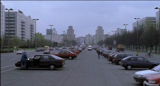 Link to Photo | architecture, Mitte, German Democratic Republic, Germany, screenshot, color, 35 mm film, road, 1990s, building, 2K resolution, capital city, East Berlin, photographic film, Berlin, Karl-Marx-Allee, Berlin Babylon