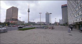 Link to Photo | architecture, Mitte, German Democratic Republic, Germany, screenshot, color, 35 mm film, road, 1990s, building, 2K resolution, capital city, East Berlin, photographic film, Berlin, Karl-Marx-Allee, Berlin Babylon