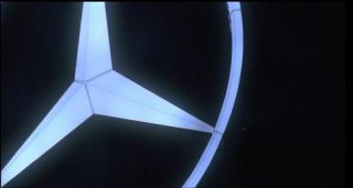 Link to Photo | rotation, Germany, Mercedes-Benz stars, screenshot, color, 35 mm film, Mercedes, 2K resolution, capital city, night, photographic film, Berlin, Europa-Center, Berlin Babylon