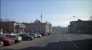 Link to Photo | passenger car, private transport, Germany, metropolis, screenshot, 1998, color, 35 mm film, point-of-view shot, 2K resolution, capital city, city, daytime, East Berlin, photographic film, Berlin, Berlin Babylon, driving