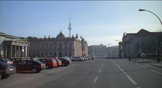 Link to Photo | passenger car, private transport, Germany, metropolis, screenshot, 1998, color, 35 mm film, point-of-view shot, 2K resolution, capital city, city, daytime, East Berlin, photographic film, Berlin, Berlin Babylon, driving