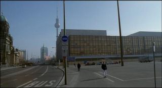 Link to Photo | passenger car, private transport, Germany, metropolis, screenshot, 1998, color, 35 mm film, point-of-view shot, 2K resolution, capital city, city, daytime, East Berlin, photographic film, Berlin, Berlin Babylon, driving