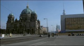 Link to Photo | passenger car, private transport, Germany, metropolis, screenshot, 1998, color, 35 mm film, point-of-view shot, 2K resolution, capital city, city, daytime, East Berlin, photographic film, Berlin, Berlin Babylon, driving