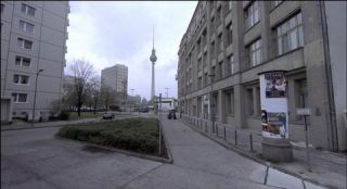 Link to Photo | architecture, Mitte, German Democratic Republic, Germany, screenshot, color, 35 mm film, road, 1990s, building, 2K resolution, capital city, East Berlin, photographic film, Berlin, Karl-Marx-Allee, Berlin Babylon