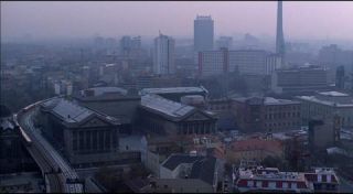 Link to Photo | big city, Mitte, Germany, metropolis, Mitte, screenshot, color, 35 mm film, high-angle shot, 1990s, historic building, panorama, 2K resolution, skyline, capital city, city, photographic film, Berlin, Berlin Babylon, panning shot
