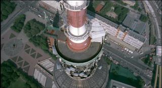 Link to Photo | television tower, Fernsehturm Berlin, Alexanderplatz, Germany, screenshot, color, 35 mm film, 90s, aerial shot, capital city, photographic film, Berlin, Berlin Babylon