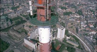 Link to Photo | television tower, Fernsehturm Berlin, Alexanderplatz, Germany, screenshot, color, 35 mm film, 90s, aerial shot, capital city, photographic film, Berlin, Berlin Babylon