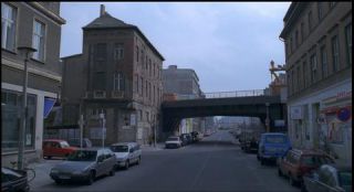 Link to Photo | passenger car, motor car, Mitte, Germany, 1990, screenshot, color, 35 mm film, point-of-view shot, 90s, urban and regional transportation, Parken Stadium, 1990s, capital city, Luisenstraße, photographic film, Berlin, Berlin Babylon, Berlin S-Bahn, driving