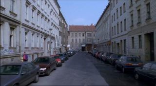 Link to Photo | passenger car, motor car, Mitte, Germany, Marienstraße, Mitte, 1990, screenshot, color, 35 mm film, point-of-view shot, Parken Stadium, 1990s, capital city, photographic film, Berlin, Berlin Babylon, driving