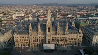 Link to Video | footage, big city, million city, Vienna, Federal State of Austria, metropolis, Rathausmann, Rathausplatz, 4K resolution, 2019, federal capital, Innere Stadt, Western Europe, Central Europe, Vienna, wide shot, Austria, Europe, aerial shot, capital city, rathaus