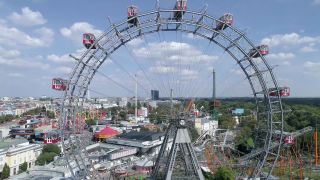 Link to Video | footage, big city, million city, Vienna, Federal State of Austria, amusement park, metropolis, Kaiserwiese, 4K resolution, 2019, federal capital, traveling carnival, Innere Stadt, Western Europe, Leopoldstadt, Wurstelprater, Austria, Europe, aerial shot, capital city, Ferris Wheel in Vienna