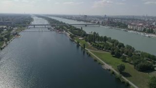 Link to Video | footage, big city, million city, Danube, Vienna, Federal State of Austria, metropolis, Donauinsel, Donauinsel, 4K resolution, 2019, federal capital, Innere Stadt, Western Europe, Donau City, Austria, Europe, aerial shot, capital city, main stream, Reichsbrücke, New Danube