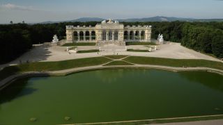 Link to Video | footage, Schönbrunn Palace, Austrian Empire, big city, million city, Vienna, Federal State of Austria, Neptunbrunnen, metropolis, palace park of Schönbrunn, 4K resolution, 2019, federal capital, Innere Stadt, Western Europe, Austria-Hungary, Austria, Europe, aerial shot, capital city, tourist attraction, Hietzing, Palace and gardens of Schönbrunn, House of Habsburg, château, Gloriette