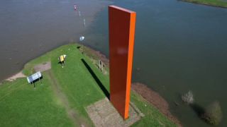 Link to Video | steel, North Rhine-Westphalia, Ruhr, Kaßlerfeld, Ruhr, Germany, Lutz Fritsch, Duisburg, color, landmark, 4K resolution, water, liquid water, red, Rhine Orange, orange, river, aerial shot, landmark, 2023, day, Rhine, art, work of art, sculpture