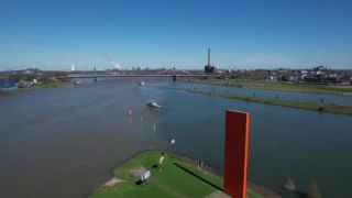 Link to Video | steel, North Rhine-Westphalia, Ruhr, Kaßlerfeld, Ruhr, Germany, Lutz Fritsch, Duisburg, color, landmark, 4K resolution, water, liquid water, red, Rhine Orange, orange, river, aerial shot, landmark, 2023, day, Rhine, art, work of art, sculpture