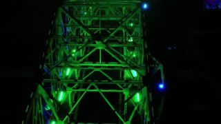 Link to Video | steel, JMW, North Rhine-Westphalia, tourist destination, bridge, artificial light, Ruhr, industrial heritage site, chimney, blast furnace, light installation, Germany, amusement park, Duisburg, color, urban park, landmark, 4K resolution, green, Meiderich, aerial shot, landmark, 2023, evening