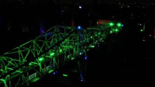 Link to Video | steel, JMW, North Rhine-Westphalia, tourist destination, bridge, artificial light, Ruhr, industrial heritage site, chimney, blast furnace, light installation, Germany, amusement park, Duisburg, color, urban park, landmark, 4K resolution, green, Meiderich, aerial shot, landmark, 2023, evening