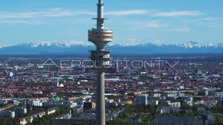 Link to Video | Munich, land, state capital, bird's-eye view, college town, tourist destination, spring, summer, establishing shot, big city, million city, daylight, outdoors, Munich, Germany, blue sky, aerial photography, color, landmark, shot, wide shot, urban municipality of Germany, Europe, Southern Germany, aerial shot, unmanned aerial vehicle, city, daytime, tourist attraction, money shot, urban area, West Germany, city or town, Eurozone, free state, Bavaria