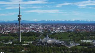 Link to Video | Munich, land, state capital, bird's-eye view, college town, tourist destination, spring, summer, establishing shot, big city, million city, daylight, outdoors, Munich, Germany, blue sky, aerial photography, color, landmark, shot, wide shot, urban municipality of Germany, Europe, Southern Germany, aerial shot, unmanned aerial vehicle, city, daytime, tourist attraction, money shot, urban area, West Germany, city or town, Eurozone, free state, Bavaria