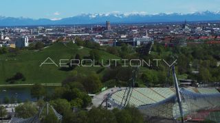 Link to Video | Munich, land, state capital, bird's-eye view, college town, tourist destination, spring, summer, establishing shot, big city, million city, daylight, outdoors, Munich, Germany, blue sky, aerial photography, color, landmark, shot, wide shot, urban municipality of Germany, Europe, Southern Germany, aerial shot, unmanned aerial vehicle, city, daytime, tourist attraction, money shot, urban area, West Germany, city or town, Eurozone, free state, Bavaria