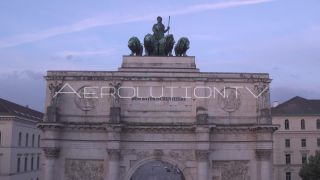 Link to Video | Munich, land, state capital, bird's-eye view, college town, spring, summer, establishing shot, big city, million city, daylight, outdoors, Munich, Germany, blue sky, aerial photography, color, shot, wide shot, urban municipality of Germany, Europe, Southern Germany, aerial shot, unmanned aerial vehicle, city, daytime, tourist attraction, money shot, urban area, West Germany, central business district, city or town, Eurozone, free state, Bavaria