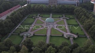 Link to Video | Munich, land, state capital, bird's-eye view, college town, spring, summer, establishing shot, big city, million city, daylight, outdoors, Munich, Germany, blue sky, aerial photography, color, shot, wide shot, urban municipality of Germany, Europe, Southern Germany, aerial shot, unmanned aerial vehicle, city, daytime, tourist attraction, money shot, urban area, West Germany, central business district, city or town, Eurozone, free state, Bavaria