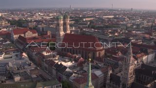 Link to Video | Munich, land, state capital, bird's-eye view, college town, spring, summer, establishing shot, big city, million city, daylight, outdoors, Munich, Germany, blue sky, aerial photography, color, shot, wide shot, urban municipality of Germany, Europe, Southern Germany, aerial shot, unmanned aerial vehicle, city, daytime, tourist attraction, money shot, urban area, West Germany, central business district, city or town, Eurozone, free state, Bavaria