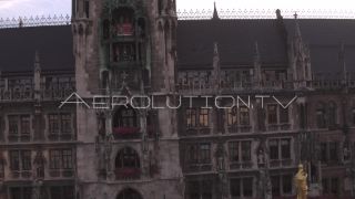 Link to Video | Munich, land, state capital, bird's-eye view, college town, spring, summer, establishing shot, big city, million city, daylight, outdoors, Munich, Germany, blue sky, aerial photography, color, shot, wide shot, urban municipality of Germany, Europe, Southern Germany, aerial shot, unmanned aerial vehicle, city, daytime, tourist attraction, money shot, urban area, West Germany, central business district, city or town, Eurozone, free state, Bavaria