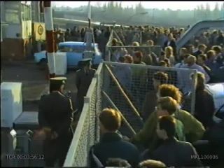Link to Video | East Berlin, occurrence, footage, military uniform, historical event, crowd, German Democratic Republic, Western Germany, Germany, 4:3, color, 1989, standard-definition television, November 10, Berlin Wall, West Berlin, border crossing, West Berlin, East Berlin, German reunification, fall of the Berlin Wall, Inner German border, West Germany, uniform, border checkpoint, Berliner